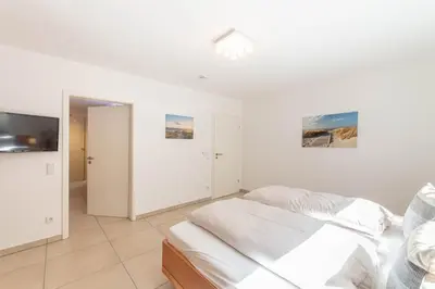 Ein Bett oder Betten in einem Zimmer der Unterkunft Ferienwohnung Möwennest