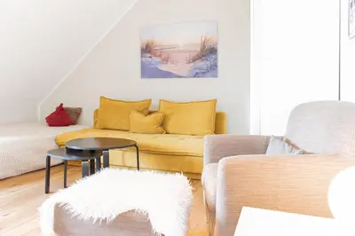Ein Sitzbereich in der Unterkunft Ferienwohnung Ocean Lodge 1