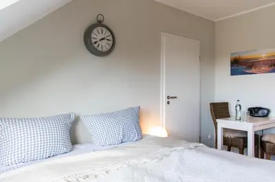 Ein Bett oder Betten in einem Zimmer der Unterkunft Ferienwohnung Ocean Lodge 3