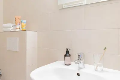 Ein Badezimmer in der Unterkunft Ferienwohnung Ocean Lodge 4