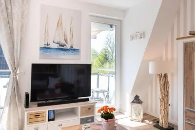 TV/Unterhaltungsangebot in der Unterkunft Ferienwohnung Windjammer