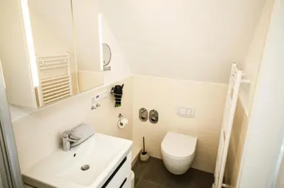 Ein Badezimmer in der Unterkunft Ferienwohnung Windrose 14