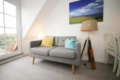 Ein Sitzbereich in der Unterkunft Ferienwohnung Windrose 14