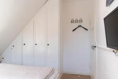 Ein Bett oder Betten in einem Zimmer der Unterkunft Ferienwohnung Ostseerauschen