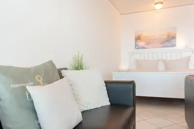Ein Sitzbereich in der Unterkunft Ferienwohnung Ostseeblick
