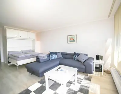 Ein Sitzbereich in der Unterkunft Ferienwohnung Residenz App. 327