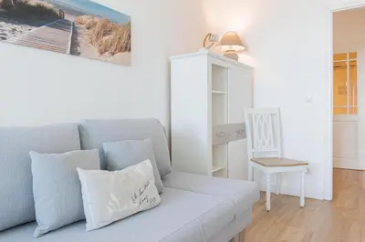 Ein Sitzbereich in der Unterkunft Ferienwohnung Residenz App. 148