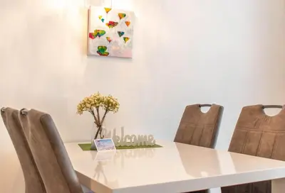 Ein Sitzbereich in der Unterkunft Ferienwohnung Sandkorn