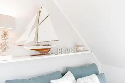 Ein Bett oder Betten in einem Zimmer der Unterkunft Ferienwohnung Sandbox