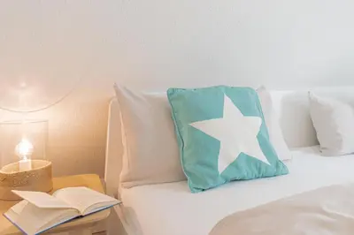 Ein Bett oder Betten in einem Zimmer der Unterkunft Ferienwohnung Sandbox