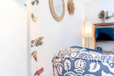 Ein Bett oder Betten in einem Zimmer der Unterkunft Ferienwohnung Schmetterlingsgarten