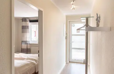 Ein Bett oder Betten in einem Zimmer der Unterkunft Ferienwohnung Seebrücke 08