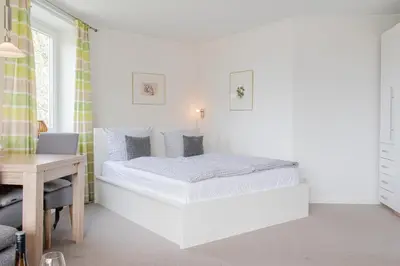 Ein Bett oder Betten in einem Zimmer der Unterkunft Ferienwohnung Seeluft
