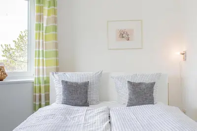 Ein Bett oder Betten in einem Zimmer der Unterkunft Ferienwohnung Seeluft
