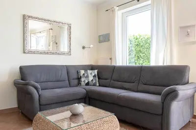 Ein Sitzbereich in der Unterkunft Ferienwohnung Seestern