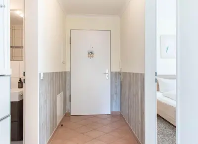 Ein Bett oder Betten in einem Zimmer der Unterkunft Ferienwohnung Seestern
