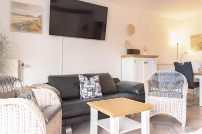 Ein Sitzbereich in der Unterkunft Ferienwohnung Seesternresidenz App.12
