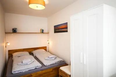 Ein Bett oder Betten in einem Zimmer der Unterkunft Ferienwohnung Seesternchen 3