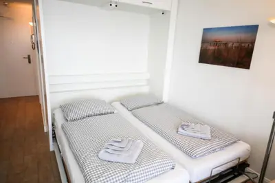 Ein Bett oder Betten in einem Zimmer der Unterkunft Ferienwohnung Sky and Sun