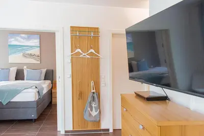 Ein Bett oder Betten in einem Zimmer der Unterkunft Ferienwohnung Sommertraum