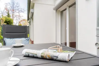 Ein Sitzbereich in der Unterkunft Ferienwohnung Sommertraum