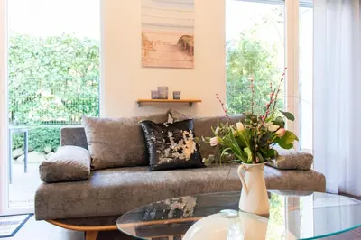 Ein Sitzbereich in der Unterkunft Ferienwohnung Sommertraum