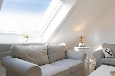Ein Sitzbereich in der Unterkunft Ferienwohnung Strandaster