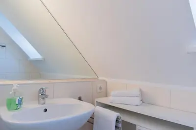 Ein Badezimmer in der Unterkunft Ferienwohnung Strandaster