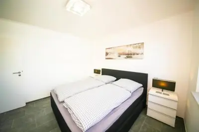 Ein Bett oder Betten in einem Zimmer der Unterkunft Ferienwohnung Sonnendeck