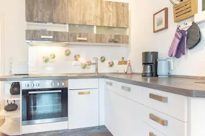 Küche/Küchenzeile in der Unterkunft Ferienwohnung Stranddüne 2