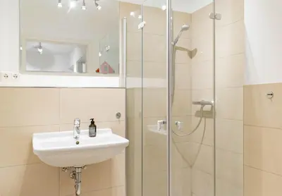 Ein Badezimmer in der Unterkunft Ferienwohnung Stranddüne 2