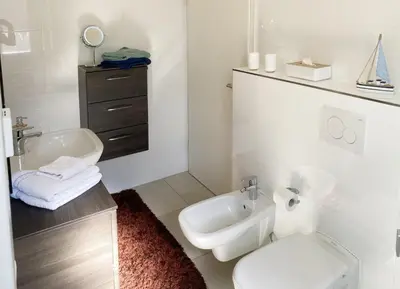 Ein Badezimmer in der Unterkunft Ferienwohnung Strandgras