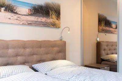Ein Bett oder Betten in einem Zimmer der Unterkunft Ferienwohnung Strandgras