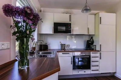 Küche/Küchenzeile in der Unterkunft Ferienwohnung Strandhaus Möwenberg App.12