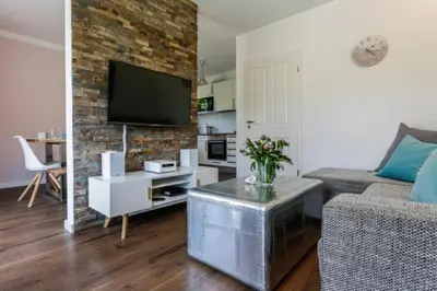 TV/Unterhaltungsangebot in der Unterkunft Ferienwohnung Strandhaus Möwenberg App.12