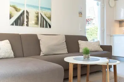 Ein Sitzbereich in der Unterkunft Ferienwohnung Strandmuschel