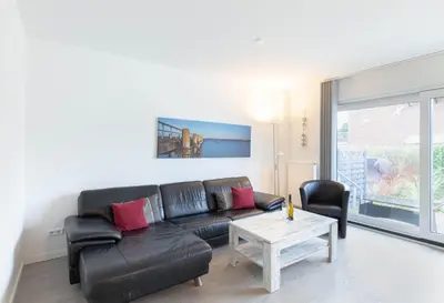 Ein Sitzbereich in der Unterkunft Ferienwohnung Strandhaus Möwenberg App.2