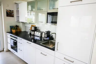 Küche/Küchenzeile in der Unterkunft Ferienwohnung Strandhaus Möwenberg App. 77