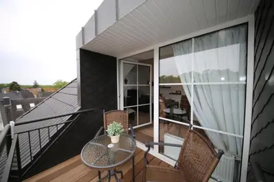 Ein Balkon oder eine Terrasse in der Unterkunft Ferienwohnung Strandnah