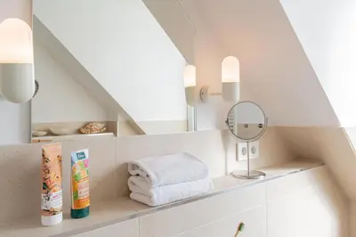 Ein Bett oder Betten in einem Zimmer der Unterkunft Ferienwohnung Strandnah