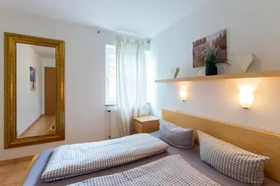 Ein Bett oder Betten in einem Zimmer der Unterkunft Ferienwohnung Strandperle