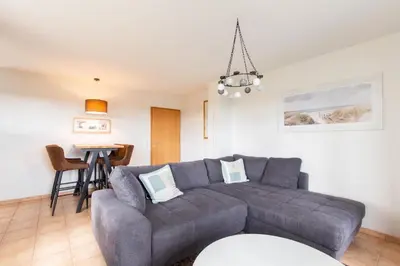 Ein Sitzbereich in der Unterkunft Ferienwohnung Strandperle