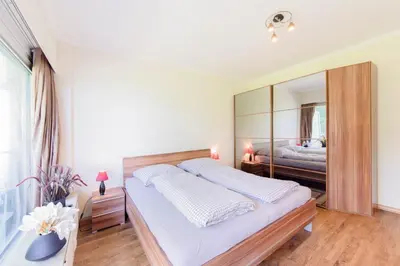 Ein Bett oder Betten in einem Zimmer der Unterkunft Ferienwohnung Strandhafer