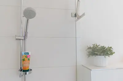 Ein Badezimmer in der Unterkunft Ferienwohnung Stranddüne B 10