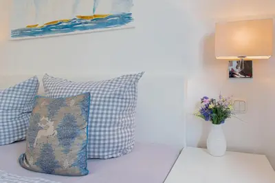 Ein Sitzbereich in der Unterkunft Ferienwohnung Stranddüne B 10