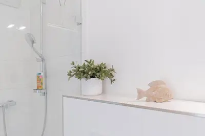 Ein Badezimmer in der Unterkunft Ferienwohnung Stranddüne B 10