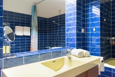 Ein Badezimmer in der Unterkunft Ferienwohnung Strandhotel
