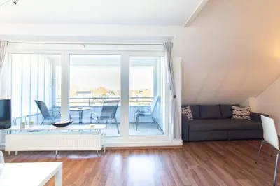 Ein Sitzbereich in der Unterkunft Ferienwohnung Residenz Barke App. 20