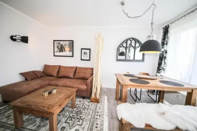 Ein Sitzbereich in der Unterkunft Ferienwohnung Seeblick