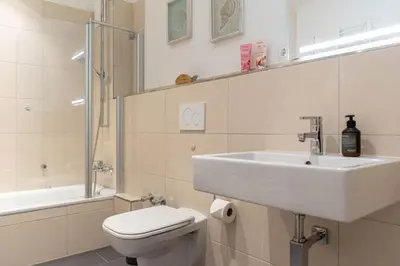 Ein Badezimmer in der Unterkunft Ferienwohnung Strandvilla Augustusbad 17